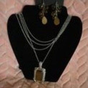 Premier Tiger eye pendent on triple silver chain and earrings.